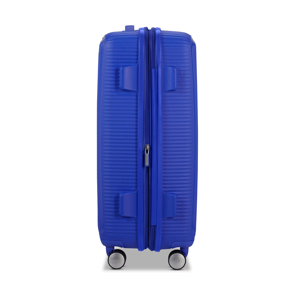 American Tourister Curio Spinner Medium in the color Cobalt Blue.