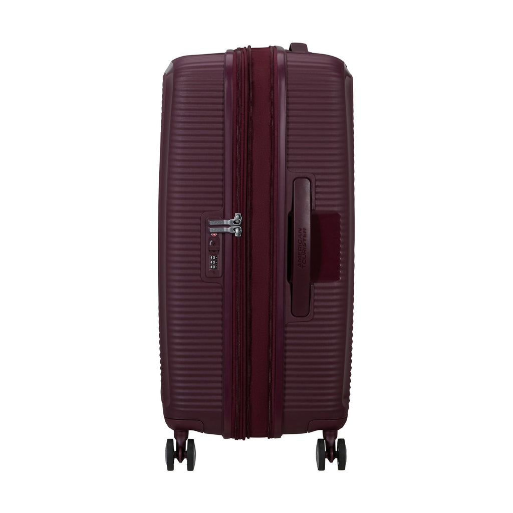 American Tourister Curio Spinner Medium in the color Wild Cherry.