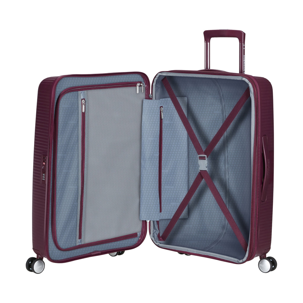 American Tourister Curio Spinner Medium in the color Wild Cherry.