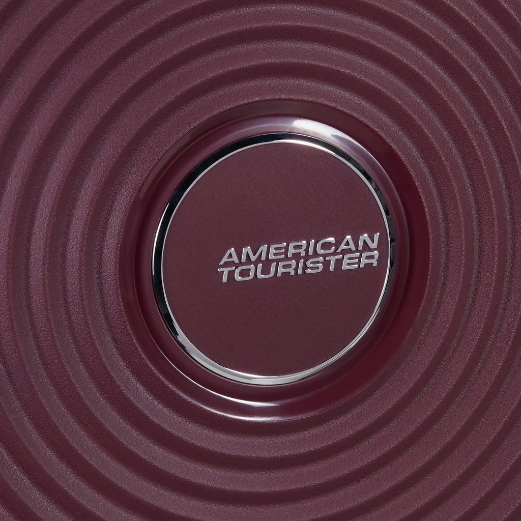 American Tourister Curio Spinner Medium in the color Wild Cherry.