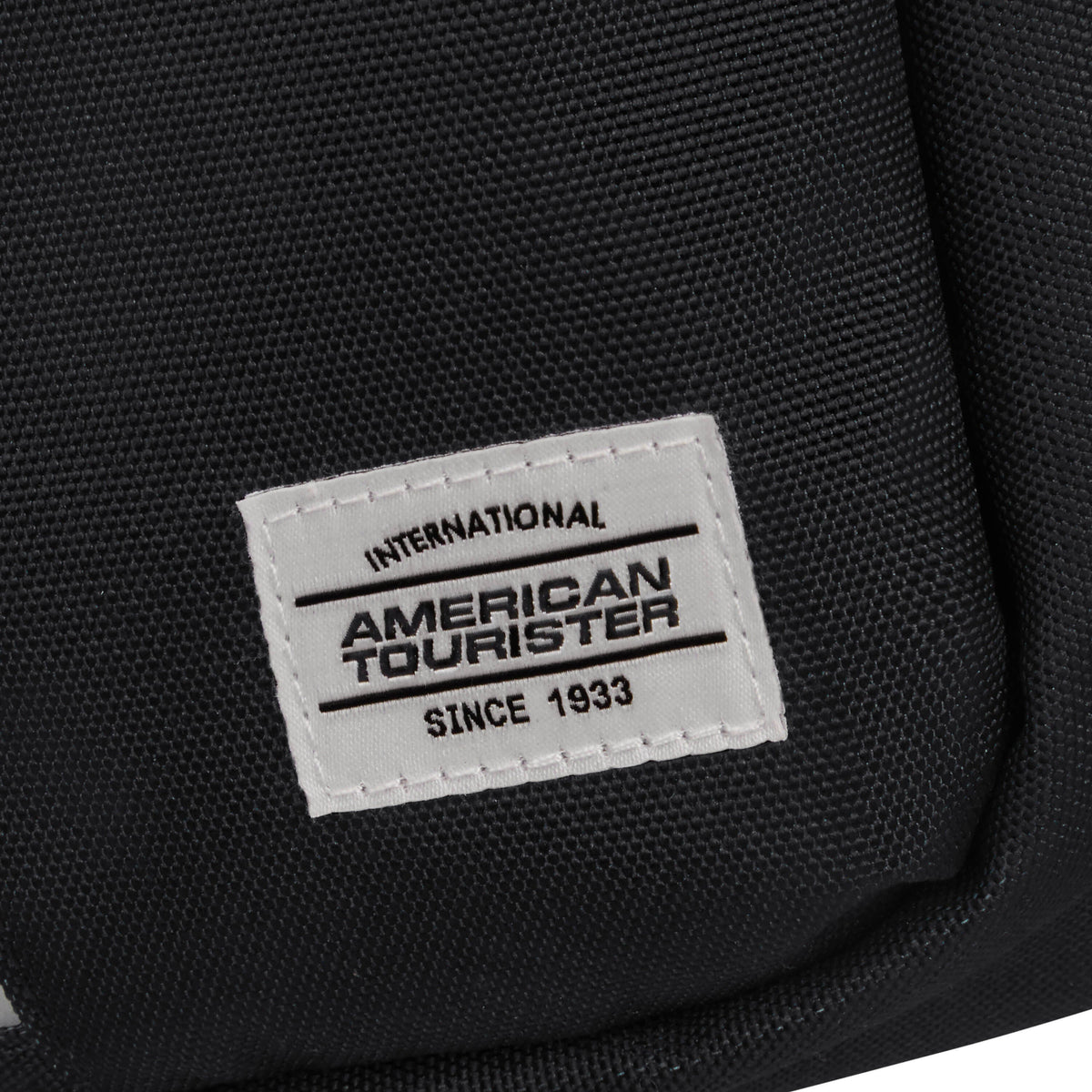 American Tourister BrightUp Sling Bag in the color Black.