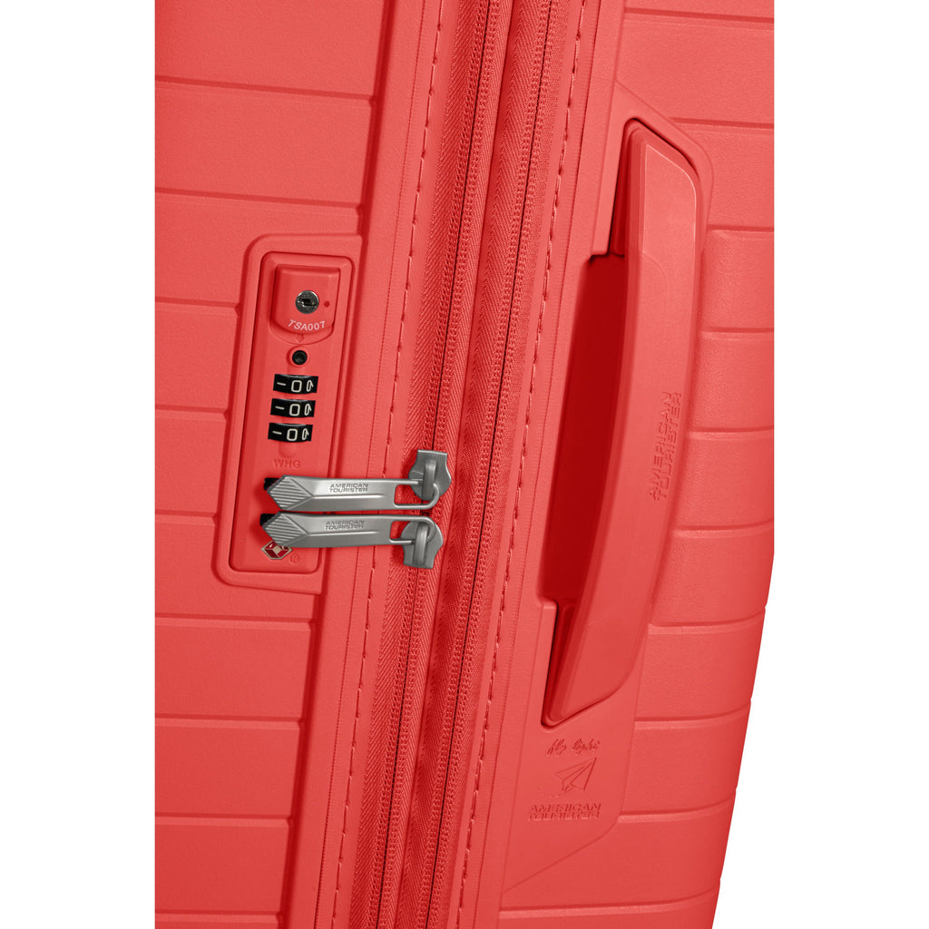 American Tourister FastForward Spinner Carry-On™ in the color Sunset Coral.
