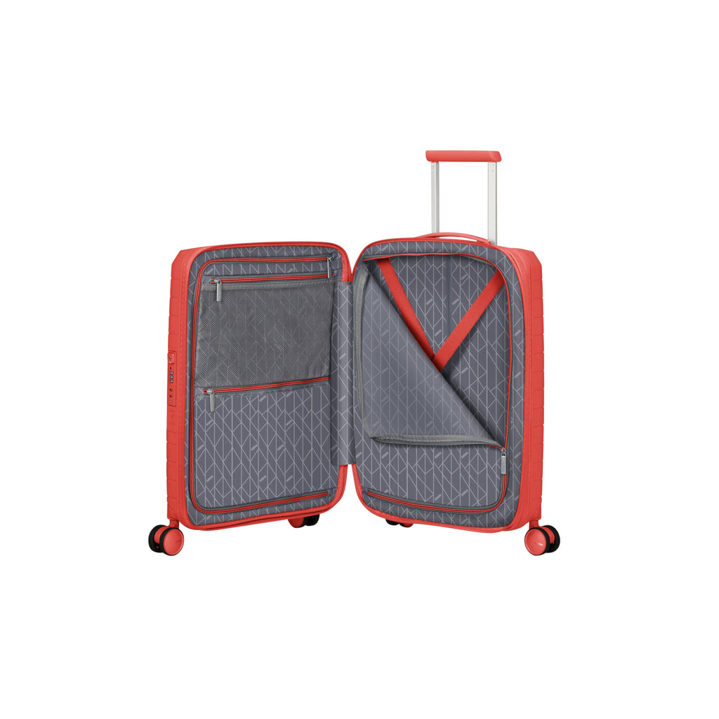 American Tourister FastForward Spinner Carry-On™ in the color Sunset Coral.
