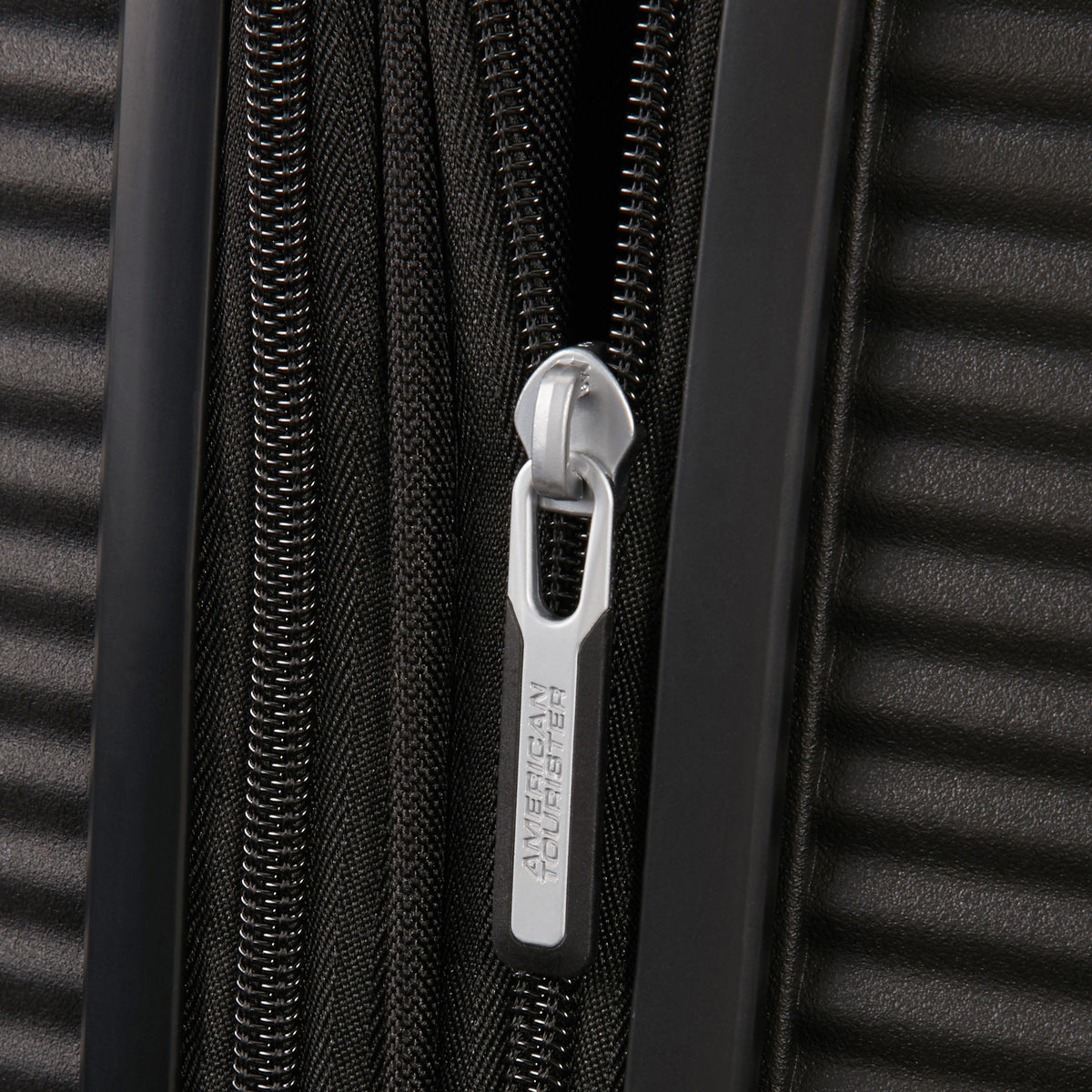 American Tourister Curio Spinner Carry-On™ in the color Bass Black.