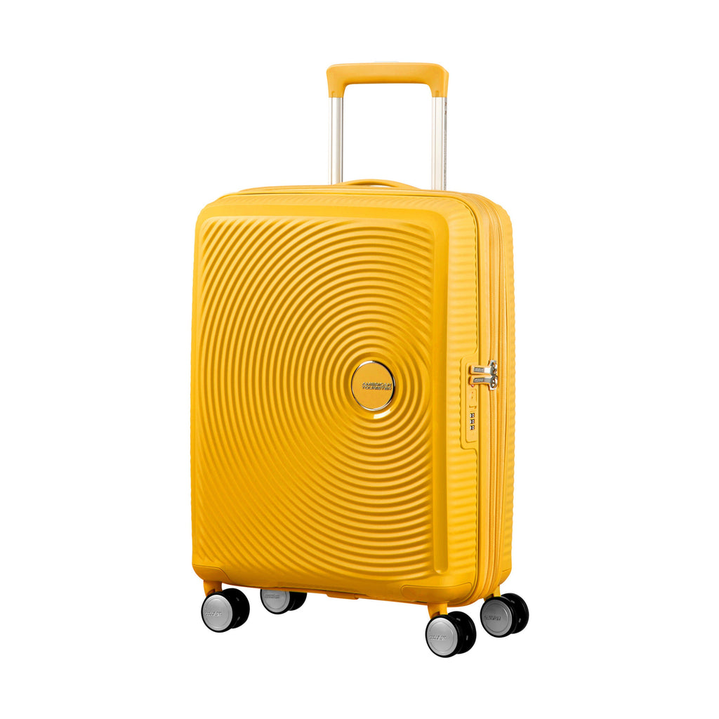 American Tourister Curio Spinner Carry-On™ in the color Golden Yellow.
