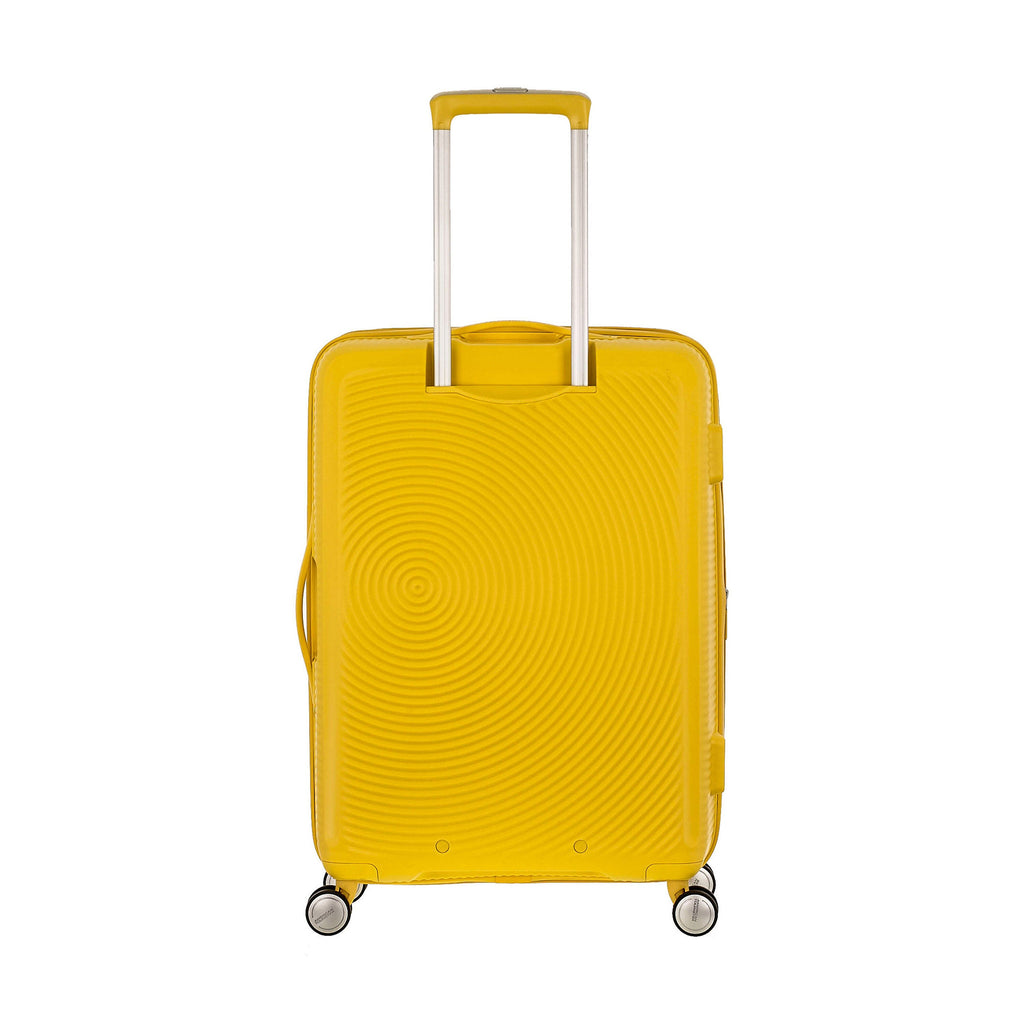 American Tourister Curio Spinner Medium in the color Golden Yellow.
